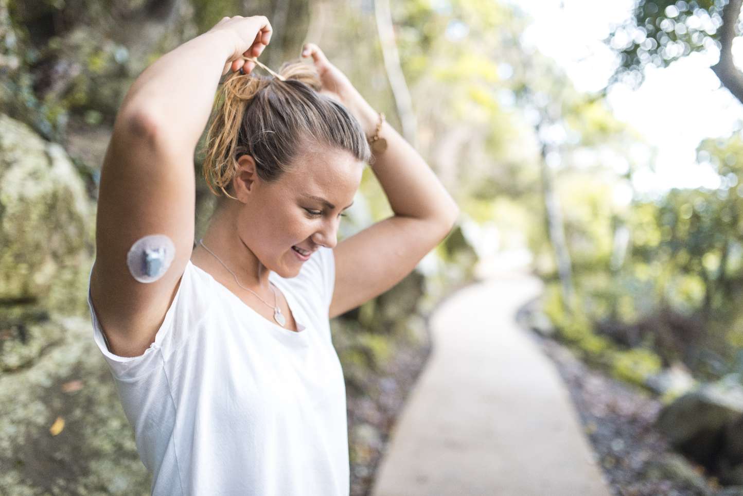 Diabetic woman preparing for a run stock photo